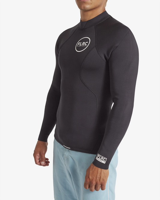 Man wearing black FLRC 1.5mm wetsuit top with white logo, angled view in studio.