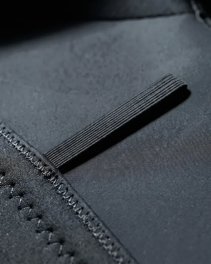 Close-up of the key loop stitched inside the fullsuit