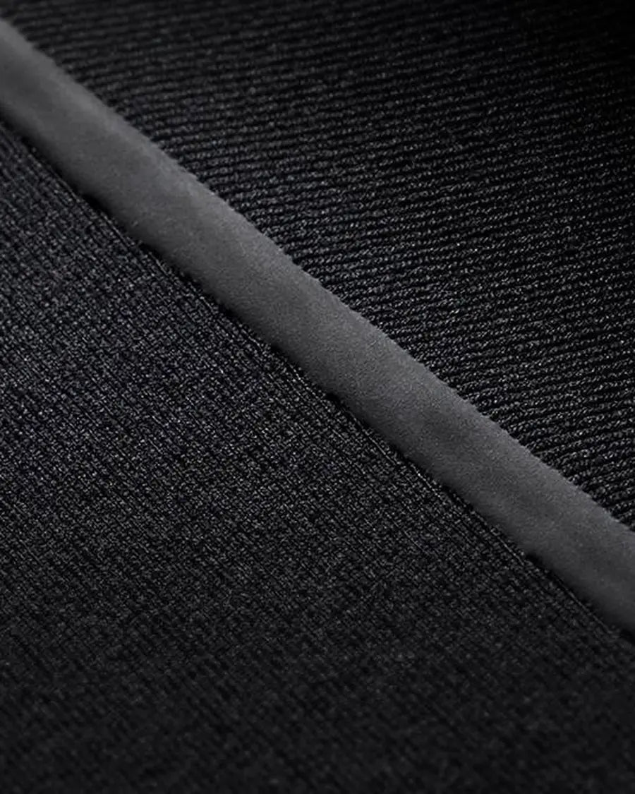 Close-up of bonded seam tape running over a seam inside the fullsuit